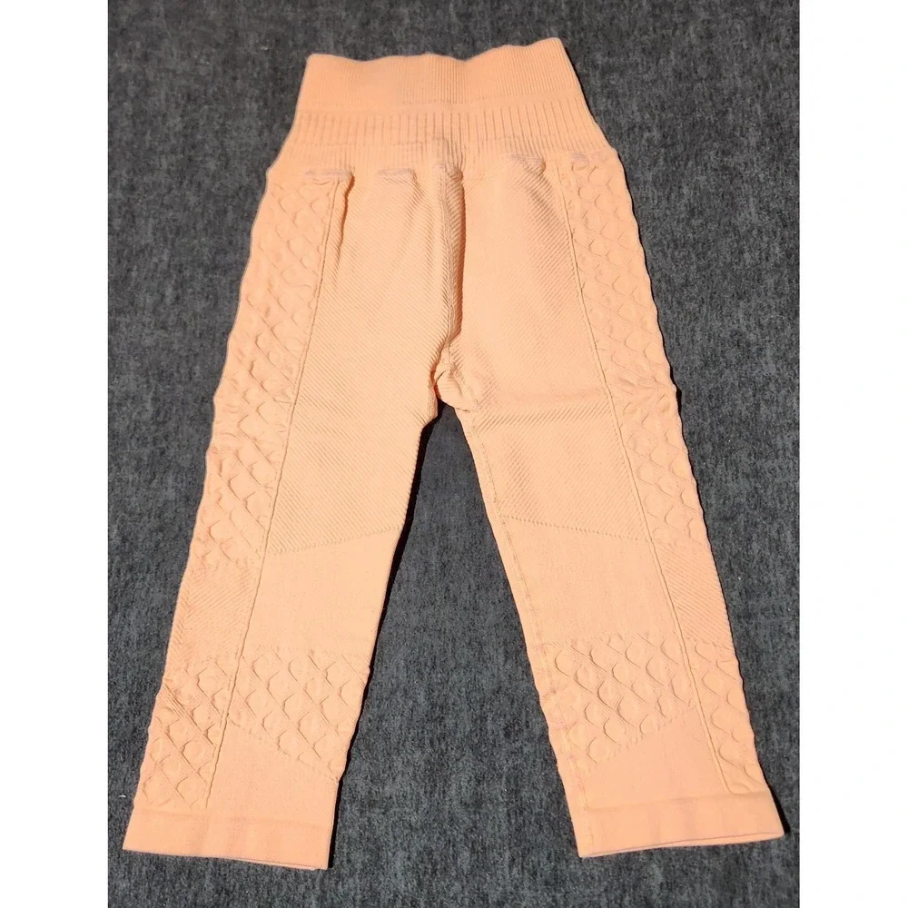 women's FREE PEOPLE Movement cropped textured leggings orange/peach Size XS‎